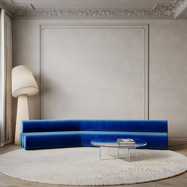 istock Classic beige interior with blue velour sofa, round rug, floor lamp and decor. 3d render illustration mockup. 2204355841