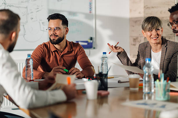 istock Business people collaborating during meeting in office boardroom 2204358533