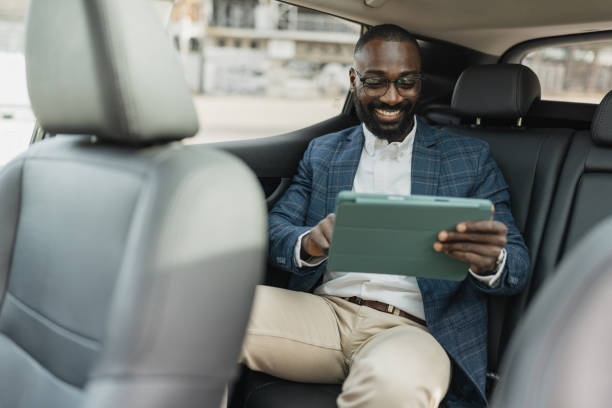 istock Man in Blue Blazer Enjoying a Relaxing Ride 2204358683