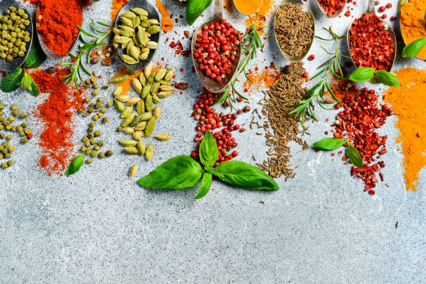 istock Spices. Fragrant Indian herbs and spices. Side view. Free space for text. 2204358948