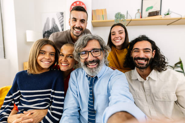 istock Multi-generational family taking a selfie together in the sofa 2204358964