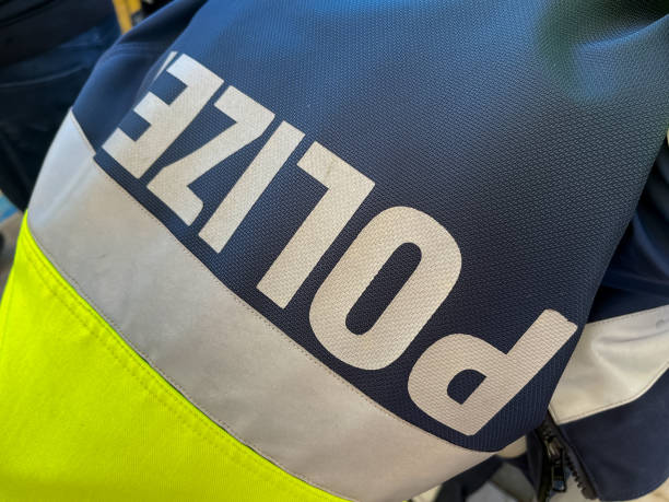 istock German Police Motorcycle Jacket Held in Hand 2204365584