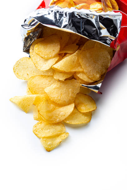 istock Chips spilling out of an open bag 2204366857