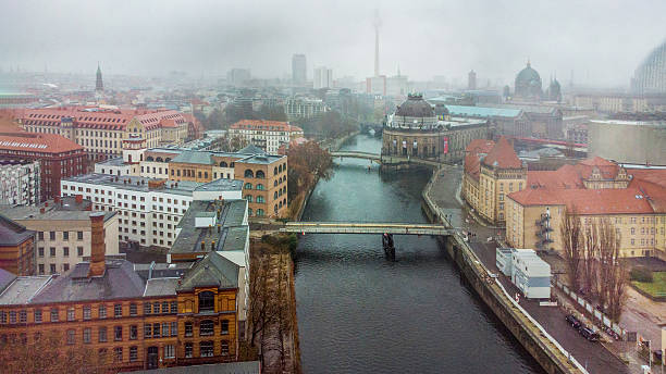 istock Ukrainian flags over the Bode- Museum in Berlin , Spree river, Cathedral 2204368213