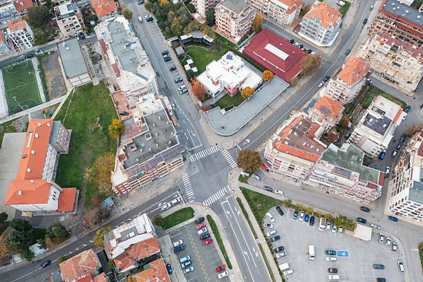 istock city road junction and car parking 2204376303