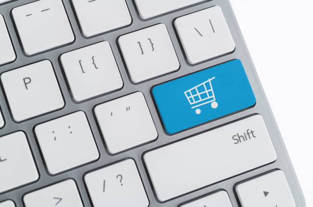 Computer keyboard with shopping cart icon