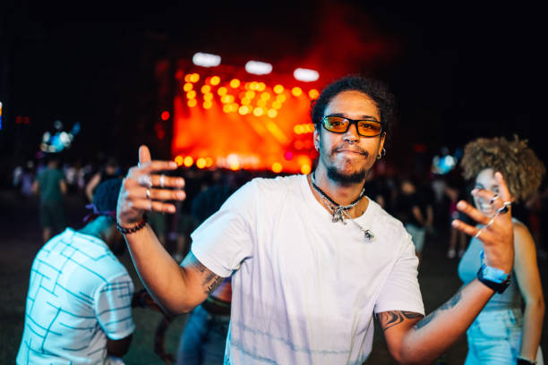 istock Energetic crowd enjoying a vibrant night concert 2204381908