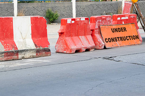 istock Concrete barriers divide construction areas on the road. 2204385525