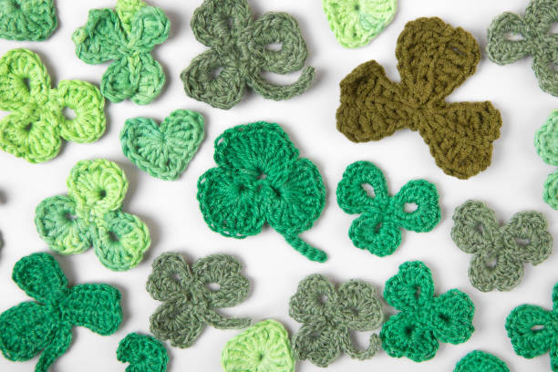istock Knitted green shamrocks 2204387781