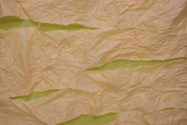 background of colored transparent shredded paper