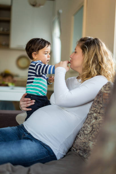 istock A Pregnant Mother Bonding with Her Toddler 2204387854