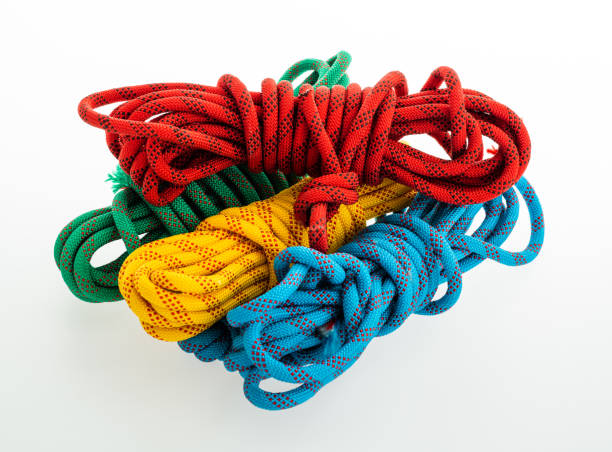 Coiled yellow, red, green and blue rope.