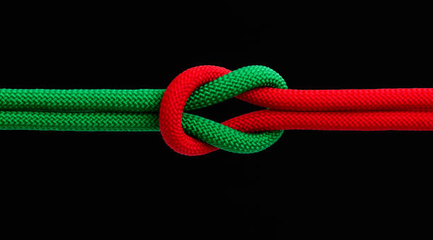 istock Ropes with reef knot on black background 2204388705