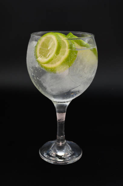 istock A glass of water with a lime slice in it 2204391359