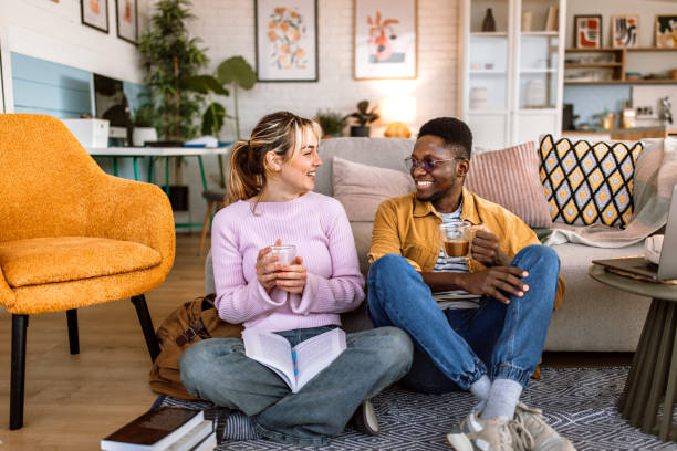 istock Friends at home taking a coffee break after homeschooling. 2204393311