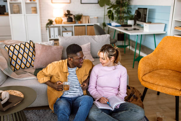 istock Friends at home taking a coffee break after homeschooling. 2204393509