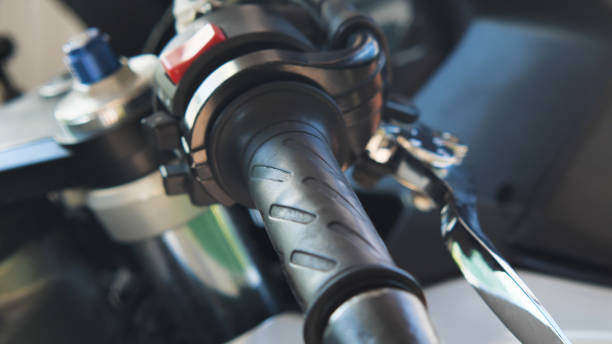 Close-up of a sport motorcycle handlebar with textured grip