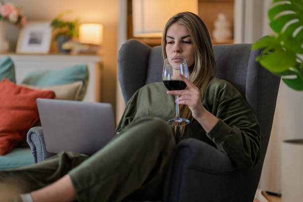 istock Woman using laptop at home 2204394919