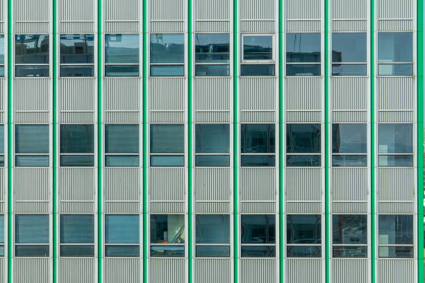 istock windows in a glass skyscraper. modern architecture and construction. office building in the city center. 2204395084