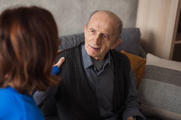 istock Senior man having a visit at nursing home 2204395181