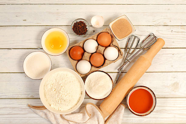 istock Kitchen baking background and recipe for cake, bread, pastry and ingredients for cooking, milk, honey, flour, salt, sugar, eggs, yeast and cream, modern bakery concept, 2204395242