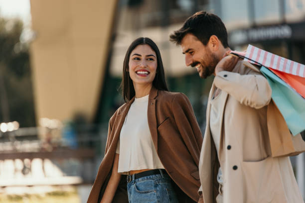 istock Elegant couple shopping 2204396340