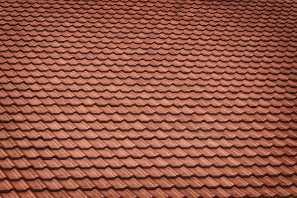 Brown tiles on the roof, background.