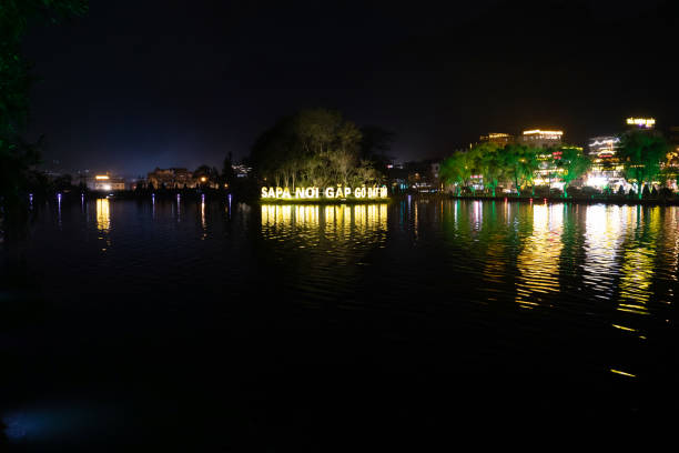 Sapa, Vietnam - March 24, 2024: Sapa city advertisement on the lake in the city center