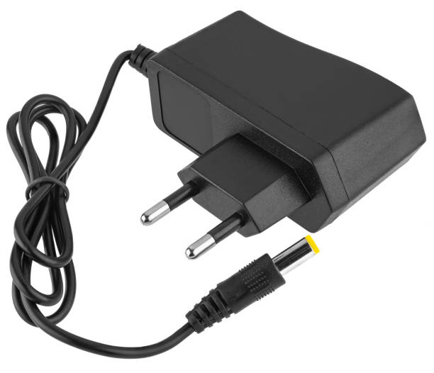 istock Power adapter for charging, on white background in insulation 2204398583