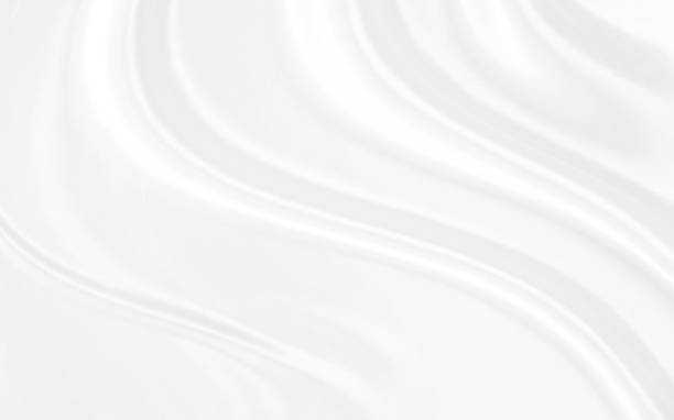 istock White gray satin texture that is white silver fabric silk background with beautiful soft blur pattern natural. 2204405505