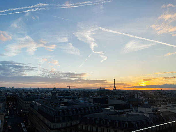 istock Scenic view of Paris skyline with Eiffel Tower during sunset 2204407242