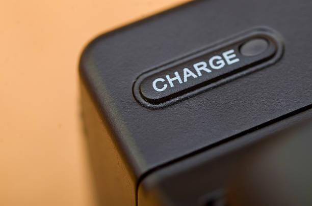 Close-Up of CHARGE Button on Electronic Device  Power and Battery Concept