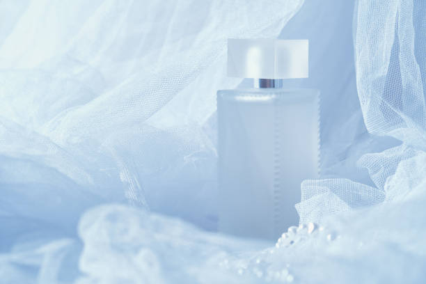 close-up blue bottle of perfume