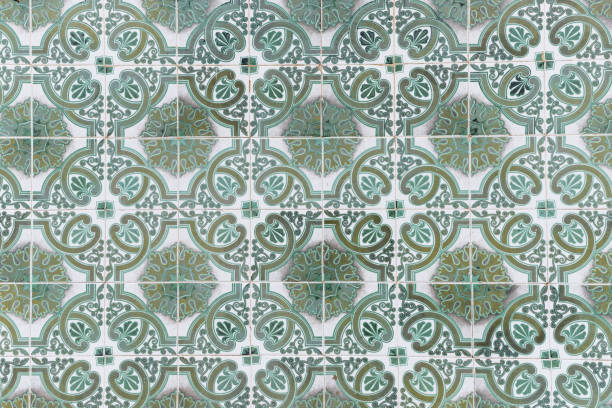 istock Traditional decorative tiles with ornate green and white patterns in a repeating design. 2204417959