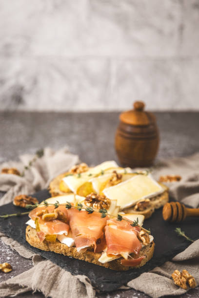 istock Tray with healthy sandwiches on the table. 2204418270