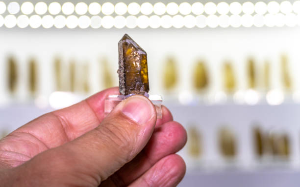 Detailed image of an orange crystalline mineral formation showcasing vibrant hues and intricate textures.