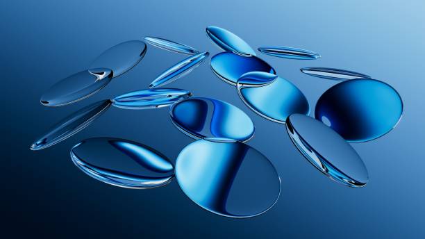 istock 3d rendered round glass shapes with a reflective surface, float on air. Futuristic abstract background featuring blue lenses. Minimalist aesthetic concept 2204420560