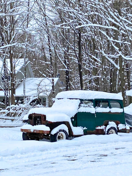 istock Old Truck On A Snowy Road Covered With Snow 2204432296