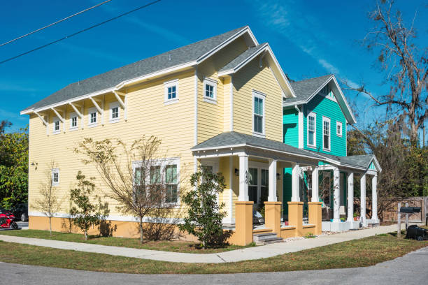 Colorful houses in a residential district of Gainesville, Florida, USA on a sunny day.