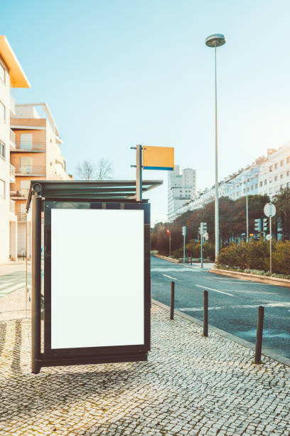istock Blank ad mockup on a city bus stop 2204440030
