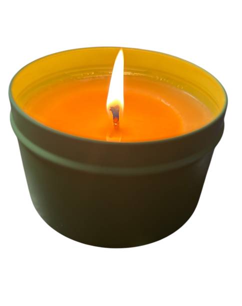 istock Orange Burning Candle in Green Tin 2204443209