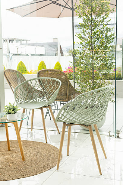 istock Modern Elegant Chairs on a Terrace with Parasol 2204449789