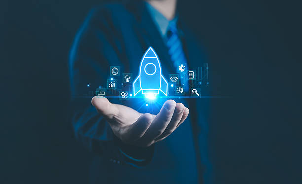istock Businessman and rocket start flying up and network line connection. 2204450646