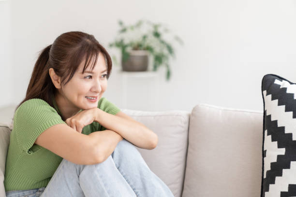 istock attractive asian woman relaxing 2204450849