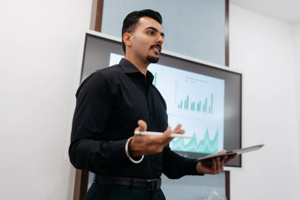 istock Confidence businessman making a presentation in the meeting 2204453511
