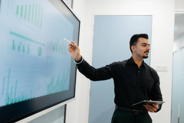 istock Confidence businessman making a presentation in the meeting 2204453533