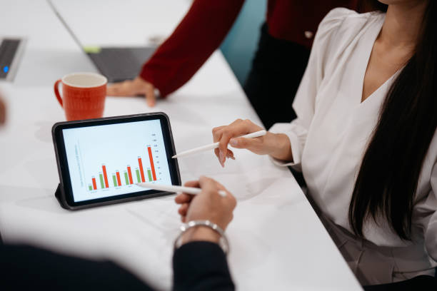 istock Asian business people working together in modern office 2204455026