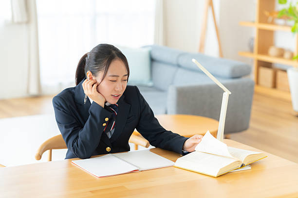 High school girl studying at home