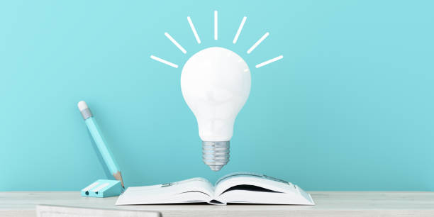 istock A floating glowing bulb above an open book with a pencil beside, symbolizing knowledge and creative thinking in a minimal study setup. 3d rendering. 2204458892