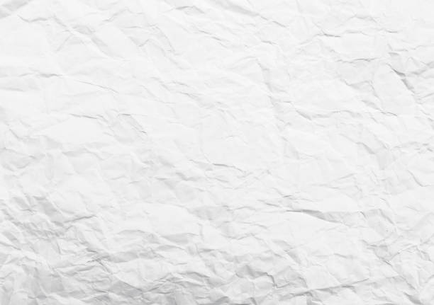 istock Cumpled white paper texture background 2204459060